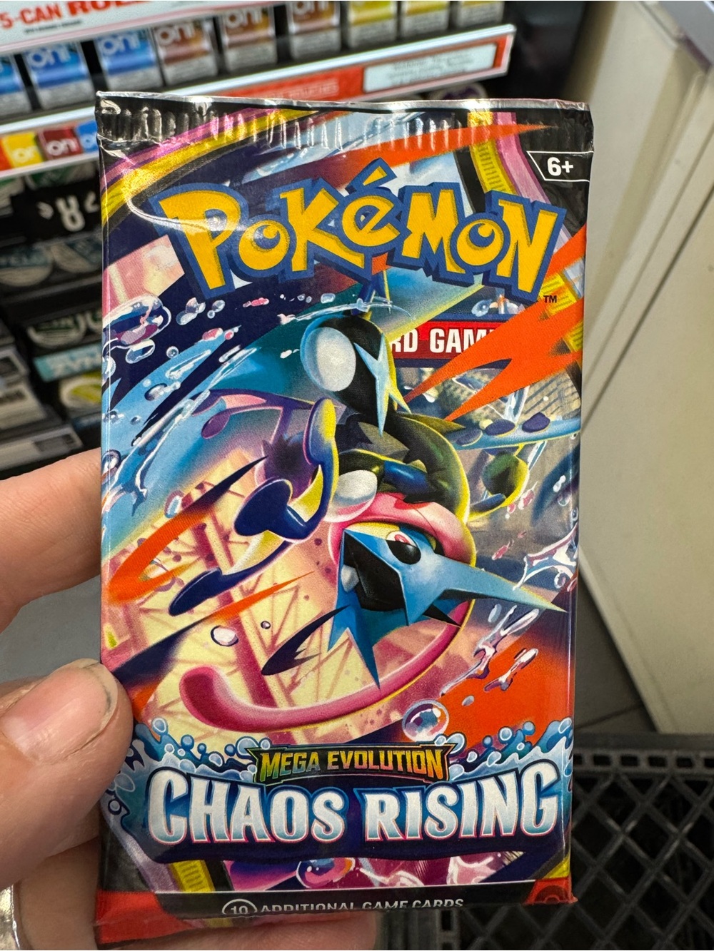Pokemon Booster Pack with Red, Black, Blue Accents. 32 packs for sale.